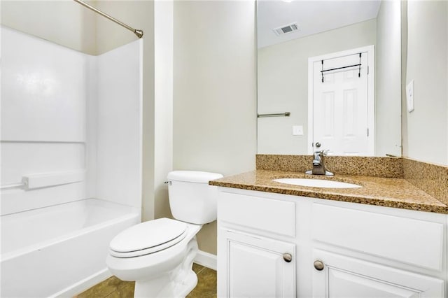 full bathroom with tile patterned floors, vanity,  shower combination, and toilet