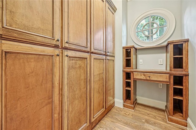 interior details featuring hardwood / wood-style flooring