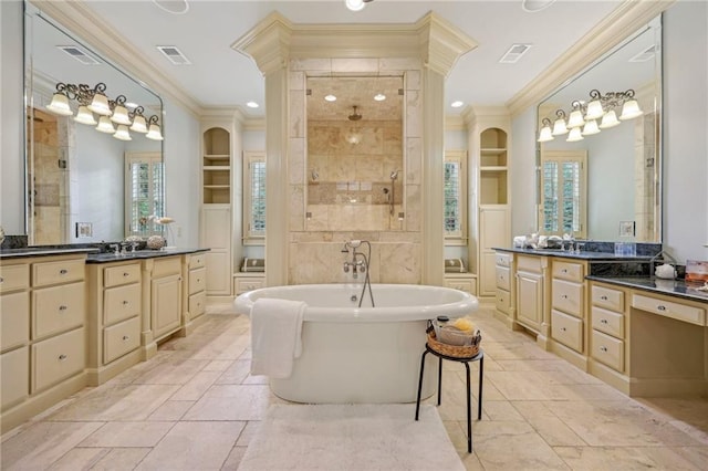 bathroom with vanity, crown molding, built in features, and separate shower and tub