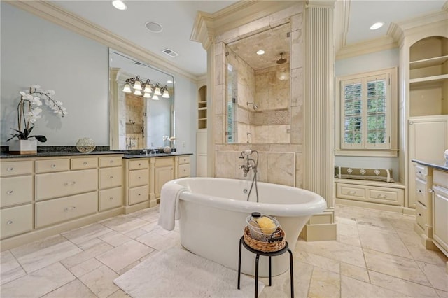 bathroom with vanity, ornamental molding, and separate shower and tub