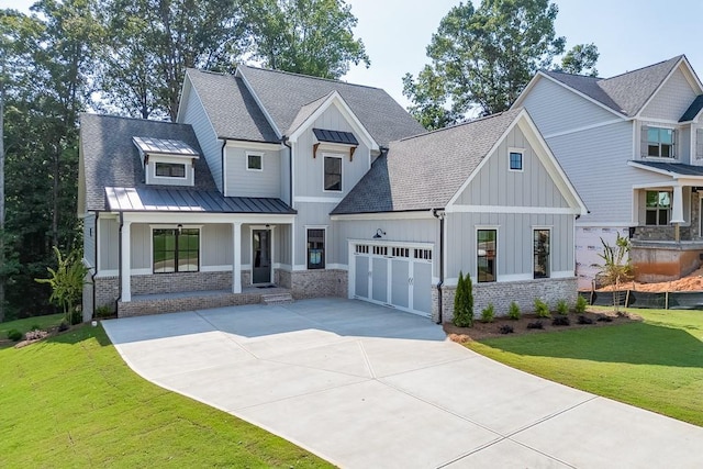 view of front of home featuring covered porch and a front lawn