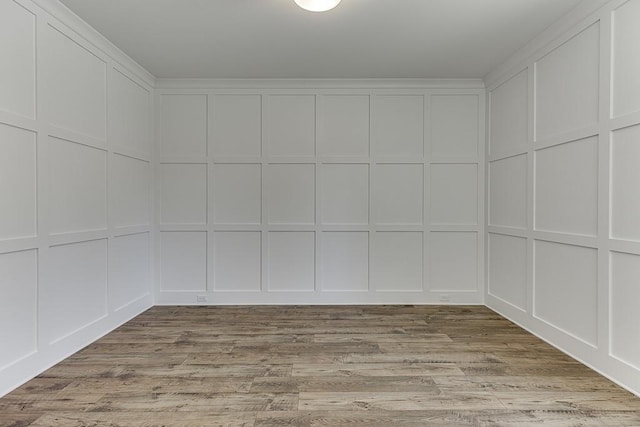 spare room featuring light hardwood / wood-style flooring