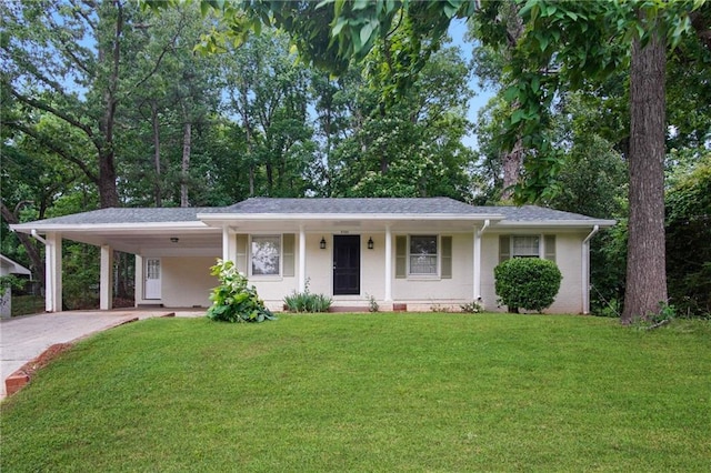 ranch-style house featuring a carport and a front yard