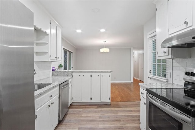 kitchen with stainless steel appliances, white cabinetry, hanging light fixtures, and a peninsula