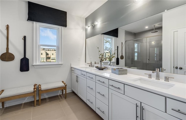 1107 Rivard Cir NW, Atlanta, GA 30318 - full bath featuring a stall shower, double vanity, baseboards, and tile patterned flooring
