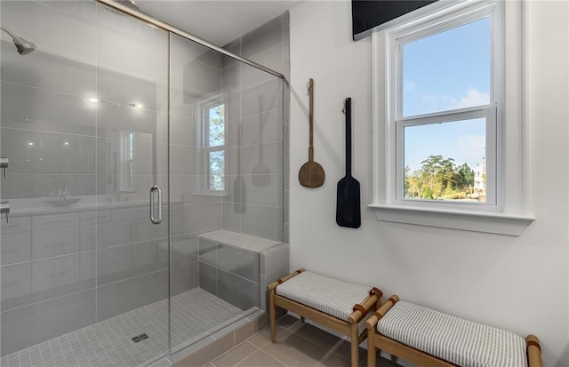 1107 Rivard Cir NW, Atlanta, GA 30318 - bathroom featuring tile patterned floors and a shower stall