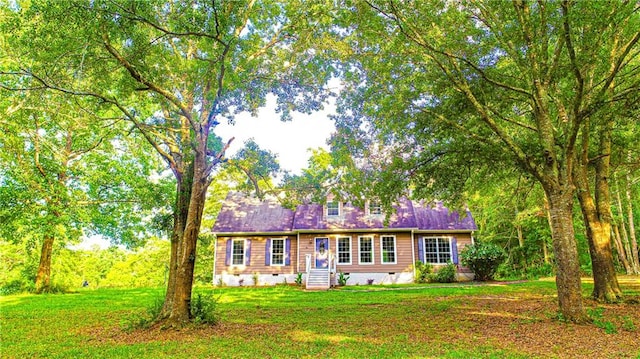 view of front facade featuring a front yard