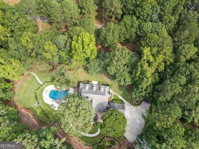 aerial view featuring a forest view