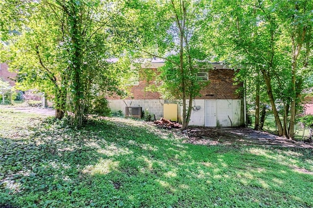 2201 Bollingbrook Dr, Atlanta, GA 30311 - view of grassy yard with central AC unit