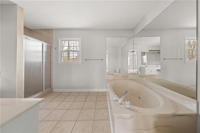 5659 Brookstone Dr NW, Acworth, GA 30101 - full bathroom featuring vanity, a shower stall, plenty of natural light, and a textured ceiling