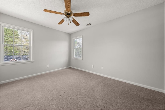 5659 Brookstone Dr NW, Acworth, GA 30101 - spare room featuring baseboards, carpet, a textured ceiling, and ceiling fan