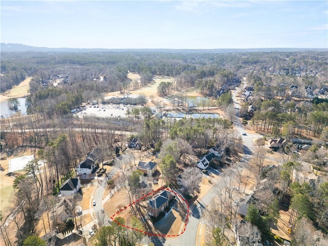 5659 Brookstone Dr NW, Acworth, GA 30101 - aerial overview of property's location featuring property boundaries highlighted, a heavily wooded area, and a large body of water