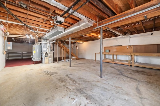 5659 Brookstone Dr NW, Acworth, GA 30101 - unfinished below grade area featuring water heater, heating unit, and electric panel