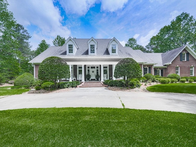 275 Frances Rd, Canton, GA 30114 - cape cod home featuring a front lawn and a porch