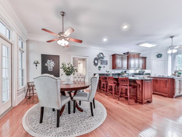 275 Frances Rd, Canton, GA 30114 - dining room featuring ceiling fan, ornamental molding, light wood-type flooring, and recessed lighting