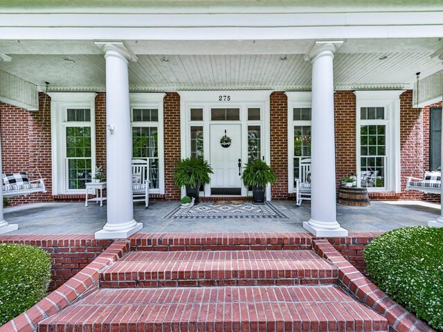 275 Frances Rd, Canton, GA 30114 - entrance to property with covered porch and brick siding