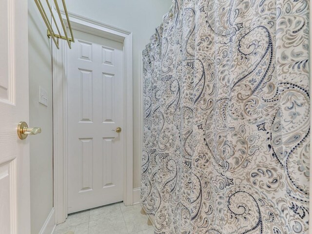 275 Frances Rd, Canton, GA 30114 - bathroom with baseboards and tile patterned floors