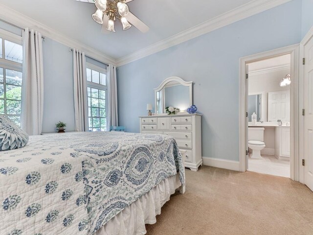275 Frances Rd, Canton, GA 30114 - bedroom with light carpet, ornamental molding, baseboards, connected bathroom, and ceiling fan