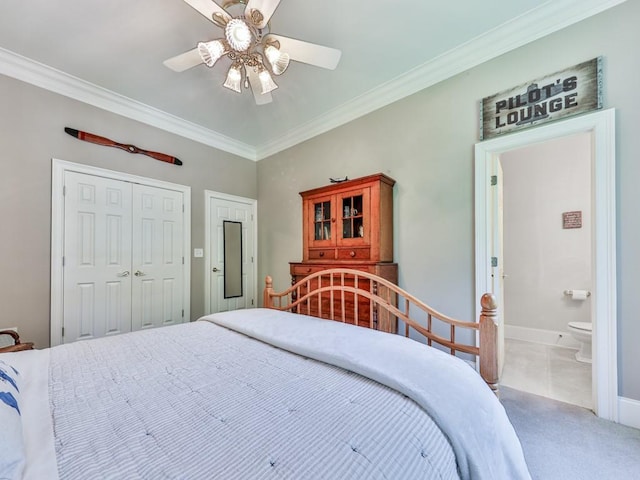 275 Frances Rd, Canton, GA 30114 - carpeted bedroom featuring crown molding, a closet, ceiling fan, baseboards, and ensuite bath
