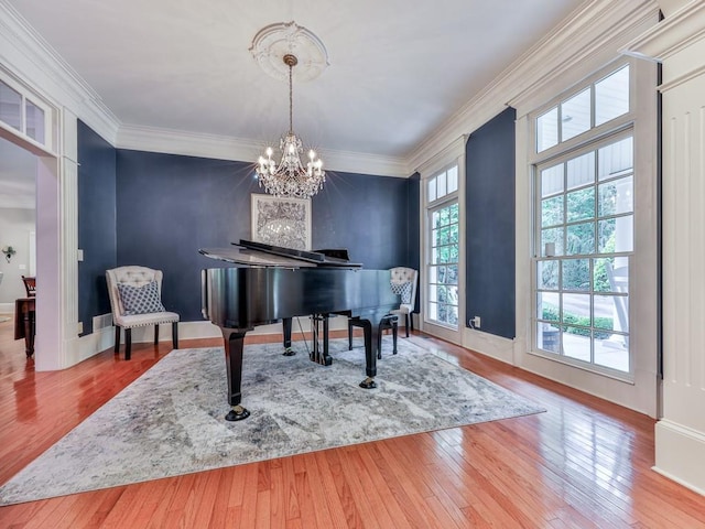 275 Frances Rd, Canton, GA 30114 - living area with wood-type flooring, a chandelier, and crown molding