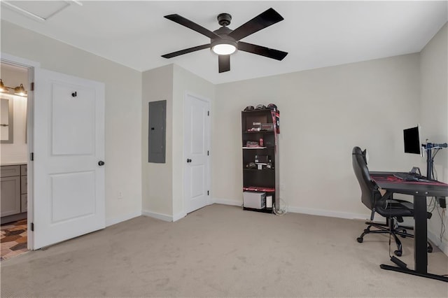 carpeted office with electric panel and ceiling fan