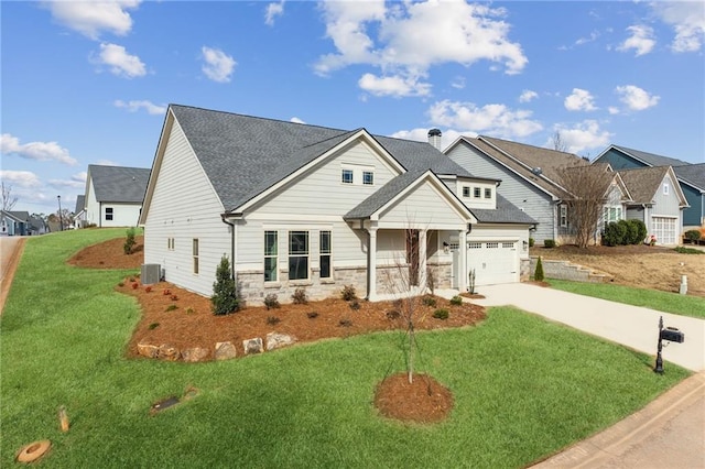4045 Links Blvd, Jefferson, GA 30549 - view of front of property featuring driveway, a front yard, stone siding, and a residential view