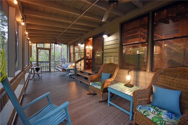 sunroom / solarium with beamed ceiling and wooden ceiling