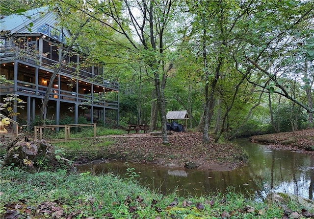 view of yard with a water view