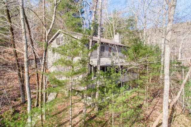 242 Buckskull Hollow Dr, Jasper, GA 30143 - back of house featuring a chimney