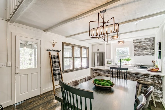 242 Buckskull Hollow Dr, Jasper, GA 30143 - dining room with dark wood finished floors, beamed ceiling, and a chandelier