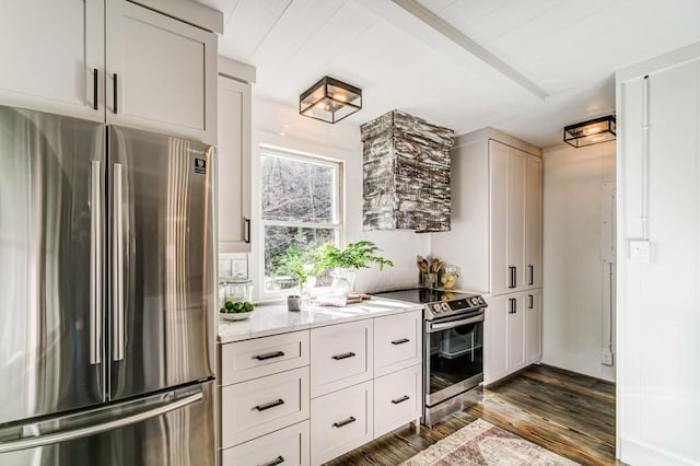 242 Buckskull Hollow Dr, Jasper, GA 30143 - kitchen with appliances with stainless steel finishes, dark wood finished floors, and light countertops