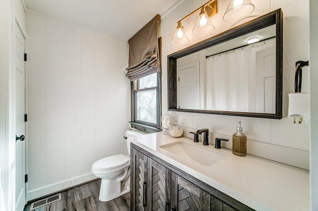242 Buckskull Hollow Dr, Jasper, GA 30143 - full bath featuring toilet, wood finished floors, and vanity