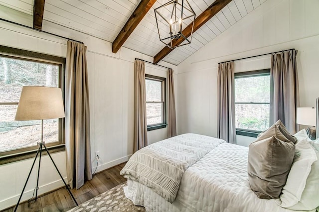 242 Buckskull Hollow Dr, Jasper, GA 30143 - bedroom with hardwood / wood-style flooring, a chandelier, wood ceiling, and a decorative wall
