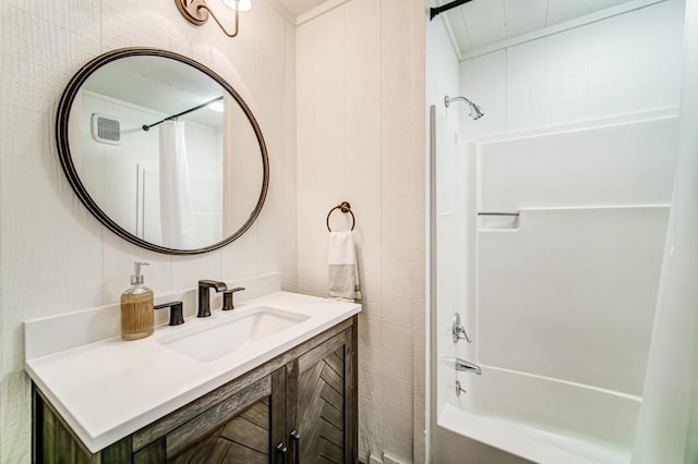 242 Buckskull Hollow Dr, Jasper, GA 30143 - full bath featuring shower / bath combo with shower curtain, vanity, and tile walls