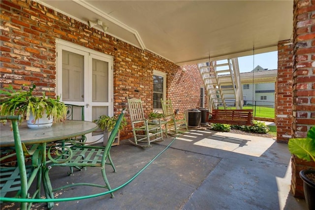 view of patio / terrace featuring central air condition unit