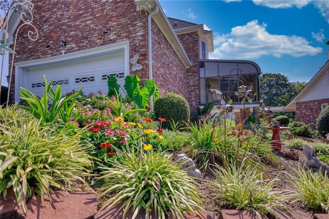 view of home's exterior with a garage