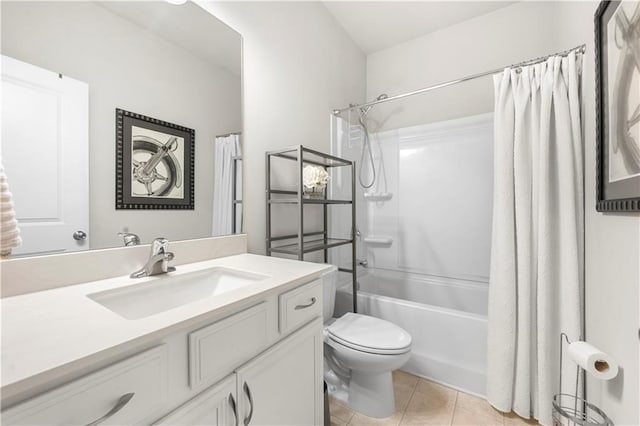 bathroom featuring shower / bath combo with shower curtain, toilet, vanity, and tile patterned flooring