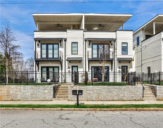 view of front of home featuring ceiling fan