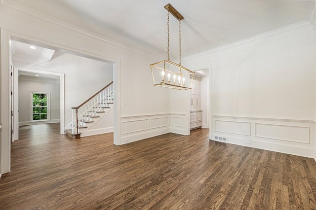 1960 Drummond Pond Rd, Milton, GA 30004 - unfurnished dining area featuring ornamental molding, dark wood-style floors, a chandelier, stairs, and wainscoting