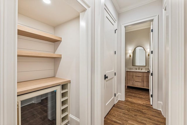 1960 Drummond Pond Rd, Milton, GA 30004 - hallway featuring wine cooler, dark wood finished floors, and crown molding