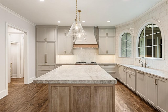 1960 Drummond Pond Rd, Milton, GA 30004 - kitchen with premium range hood, crown molding, a kitchen island, tasteful backsplash, and gray cabinetry
