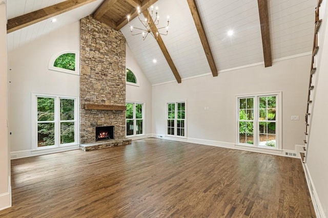 1960 Drummond Pond Rd, Milton, GA 30004 - unfurnished living room with a chandelier, high vaulted ceiling, dark wood-style flooring, a fireplace, and healthy amount of natural light