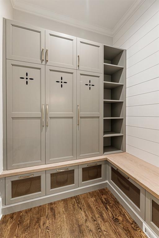 1960 Drummond Pond Rd, Milton, GA 30004 - mudroom with ornamental molding, dark wood-style floors, and wooden walls