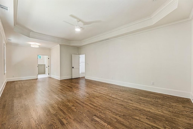 1960 Drummond Pond Rd, Milton, GA 30004 - spare room featuring dark wood-style floors, ornamental molding, a ceiling fan, and a raised ceiling