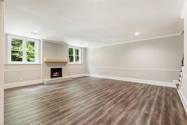 1960 Drummond Pond Rd, Milton, GA 30004 - unfurnished living room featuring a fireplace, dark wood finished floors, ornamental molding, and recessed lighting