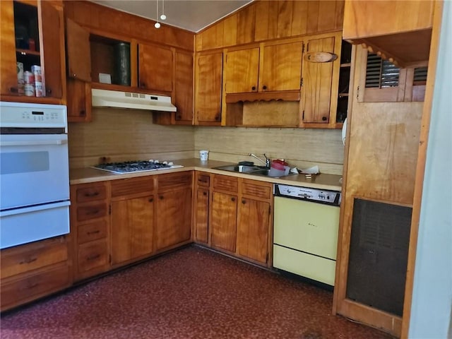 kitchen with sink, dishwasher, stainless steel gas cooktop, and backsplash