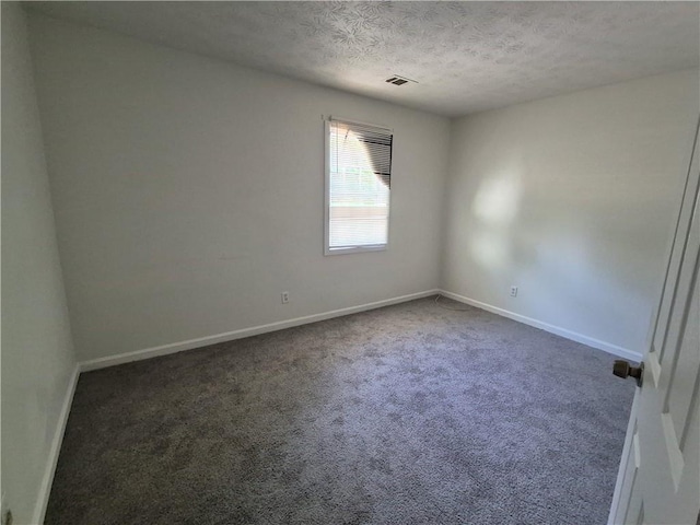 3832 Natalie Way, Ellenwood, GA 30294 - unfurnished room with carpet flooring, a textured ceiling, and baseboards