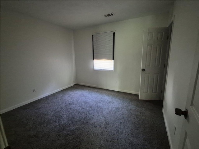 3832 Natalie Way, Ellenwood, GA 30294 - unfurnished room featuring dark carpet and baseboards