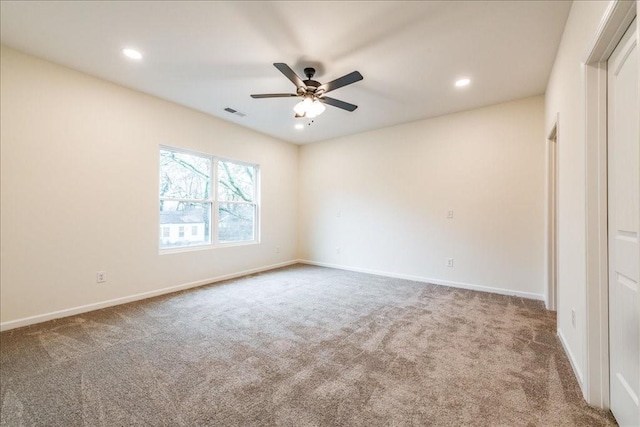 unfurnished bedroom featuring ceiling fan and carpet