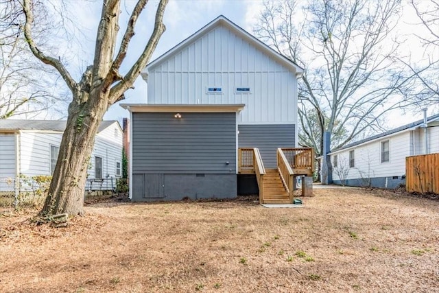 rear view of house with a deck